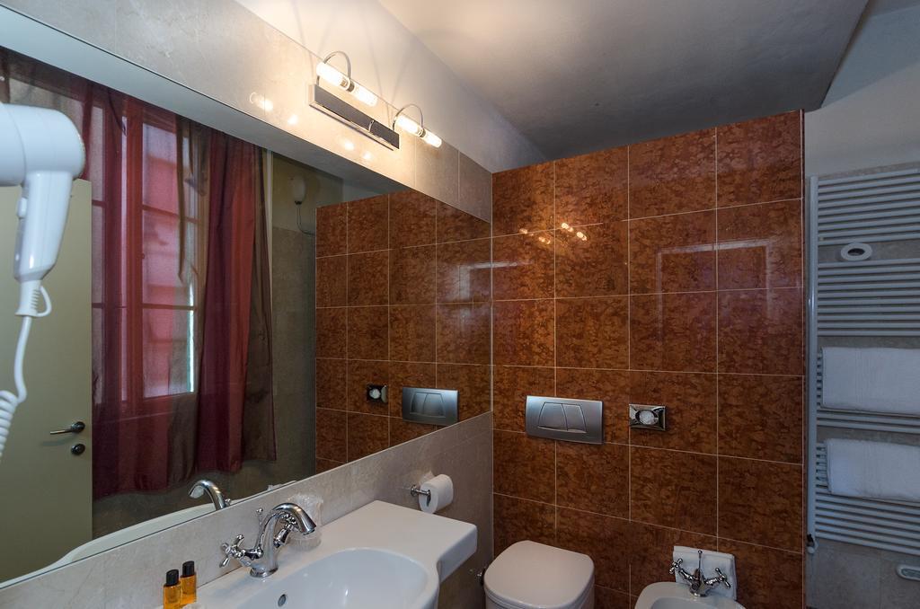 Hotel Novecento Пиза Экстерьер фото